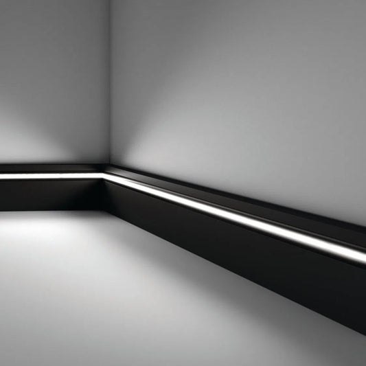IL11 2M BLACK WALLSTYL SKIRTING BOARD - Skirtings with cable channel owner detail on a light-colored wall | DecorMania UK | DecorMania UK