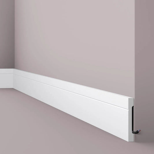 FD2 2.44M WALLSTYL SKIRTING BOARD - Skirtings with cable channel owner detail on a light-colored wall| DecorMania UK