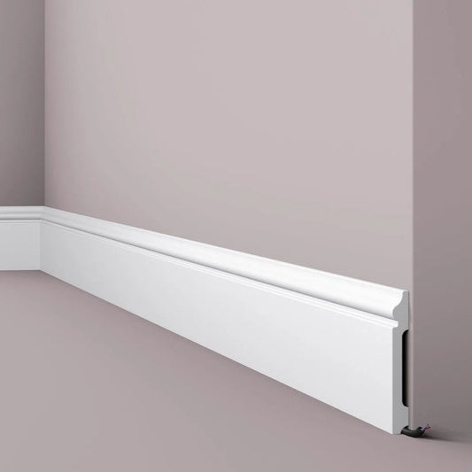FL2 2M WALLSTYL SKIRTING BOARD - Skirtings with cable channel owner detail on a light-colored wall | DecorMania UK
