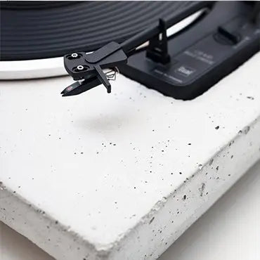 Close-up of a turntable with a concrete base from WallSET Architectural Concrete Wall Panels - WHITE | DecorMania UK 