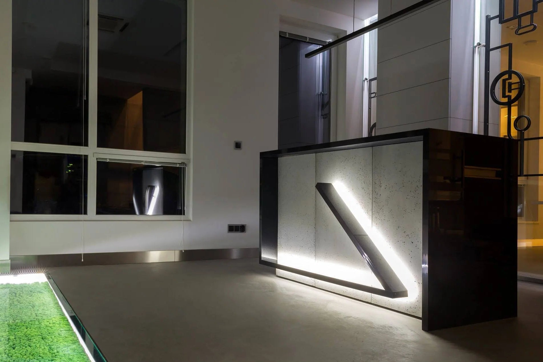 Modern interior concrete design with a black and white architectural concrete feature, 