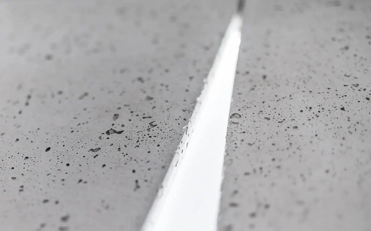 Close-up of a white concrete bespoke panel with insetred LED light  