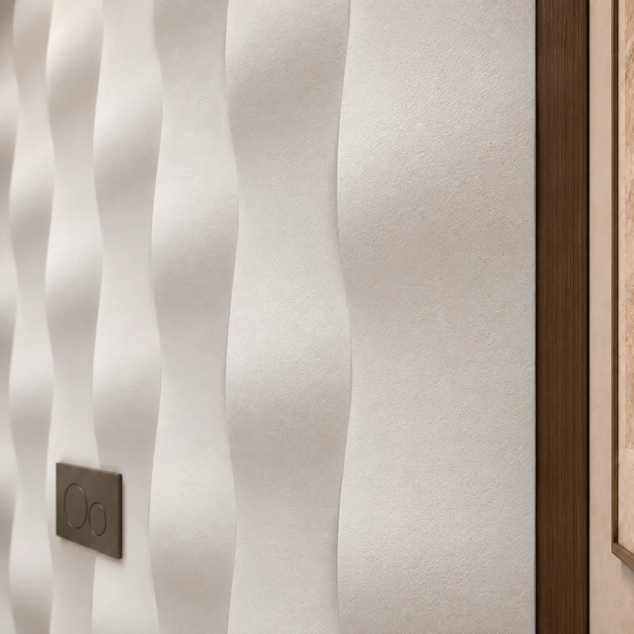 Close view of Drop 3D gypsum wall panels showing their matte texture and curved relief beside a dark wood border