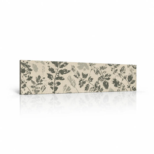 Grey Forest decorative wall panel with layered grey leaf silhouettes on a cream background, shown with a soft reflection