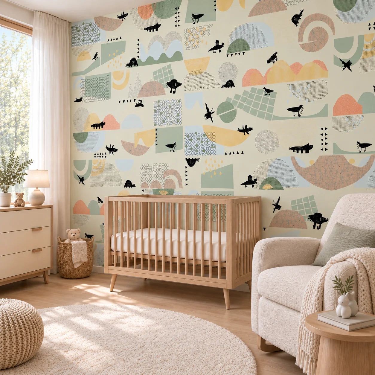 Angled view of Juhu wall panels in a nursery with a wooden cot and cream armchair