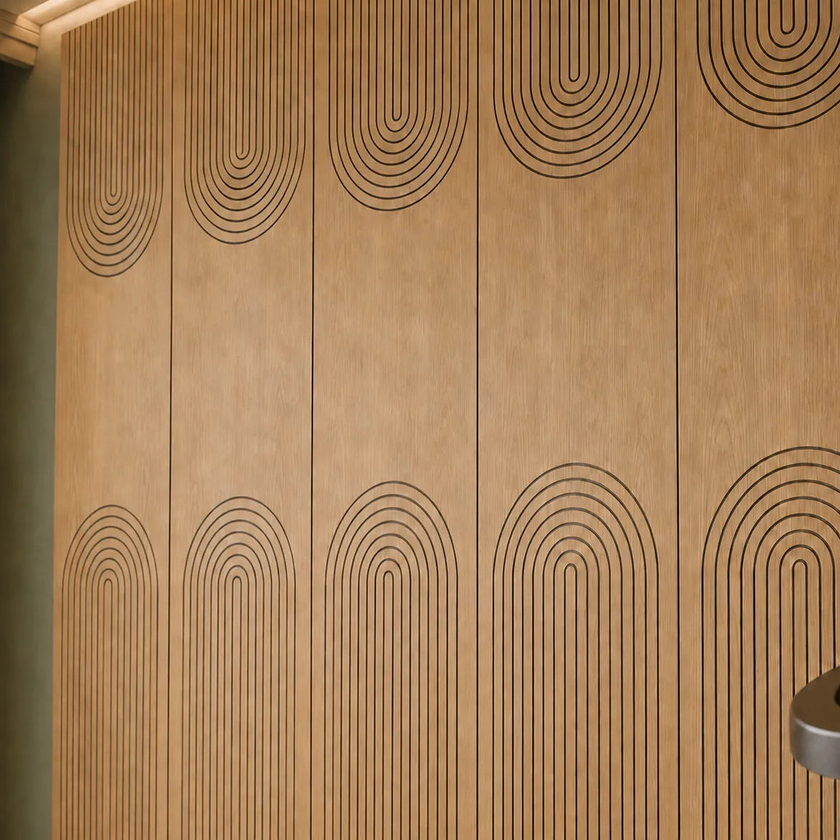 Close-up of oak acoustic wall panels with curved black MDF grooves
