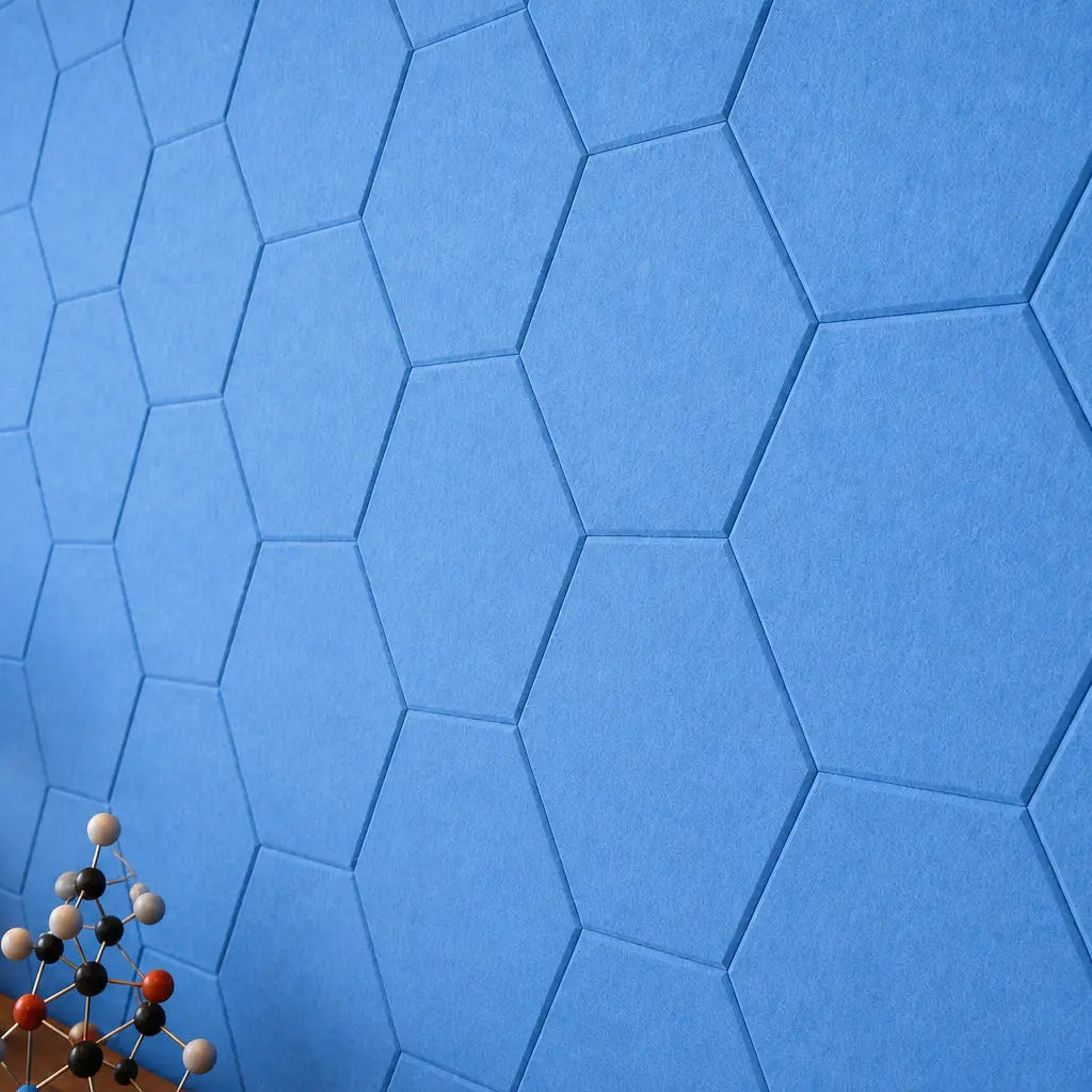 Blue HEXA 3D PET felt wall panel with a geometric hexagonal shape close up view