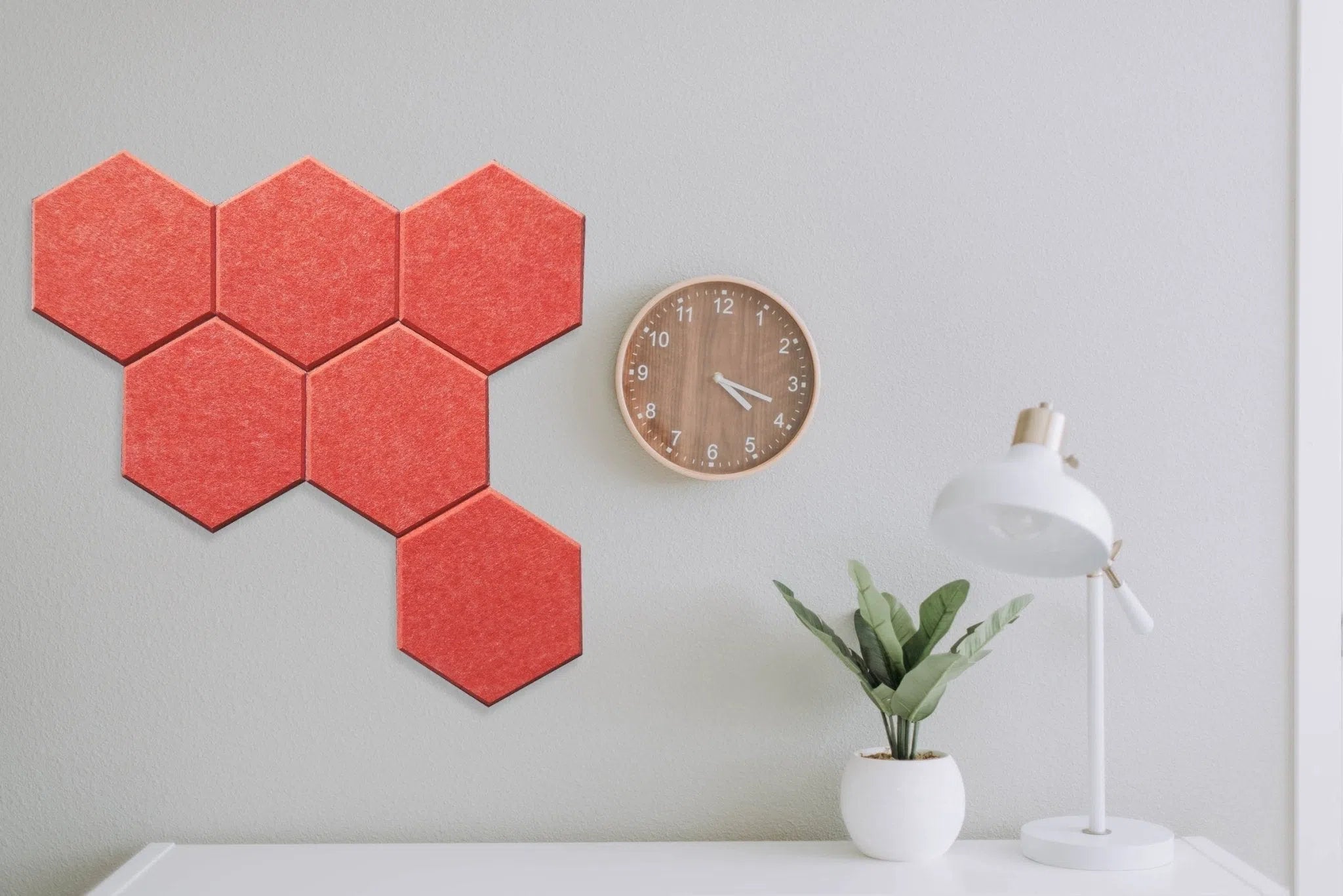 Arrangement of HEXA Felt 3D PET Wall Panels in orange | DecorMania UK
