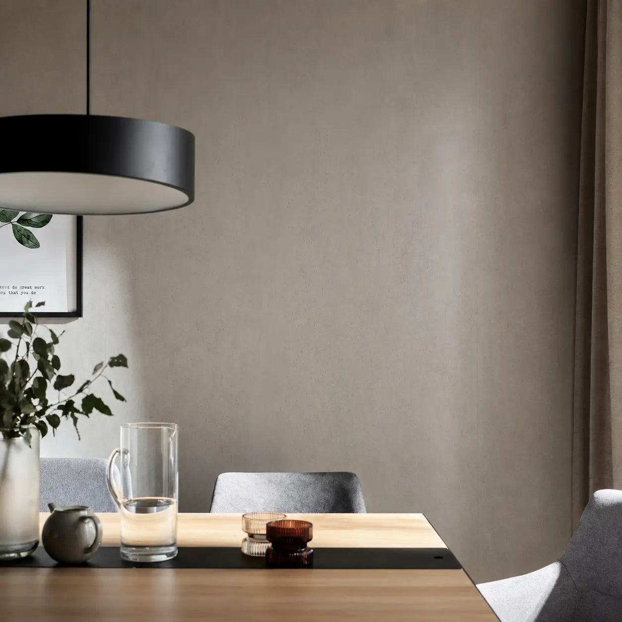 Mineral Light Grey concrete wall panels in a modern dining room close-up