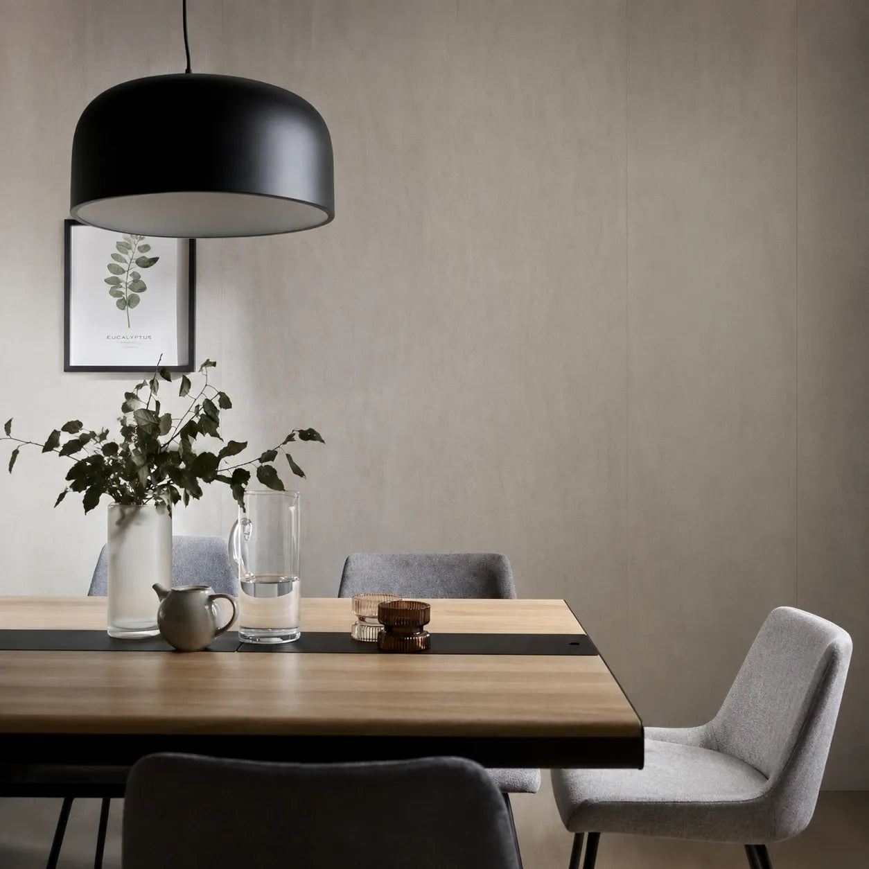 Mineral Light Grey wall panels behind a contemporary wooden dining table