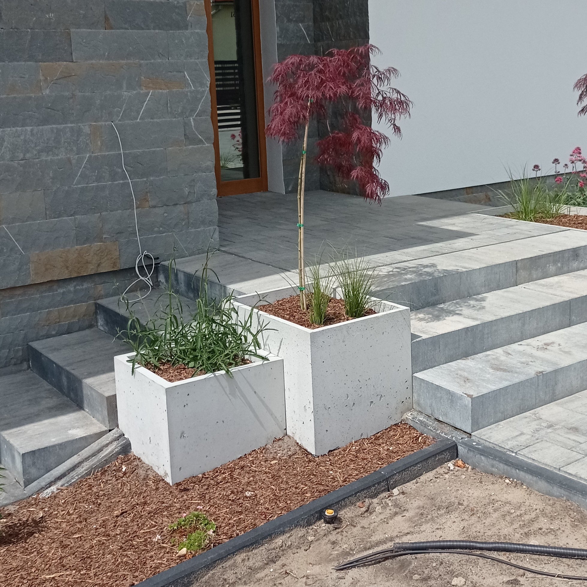 Outdoor Concrete Planters - Rectangle 50x120x50 cm in frontyard of a house next to the stairs Decormania UK