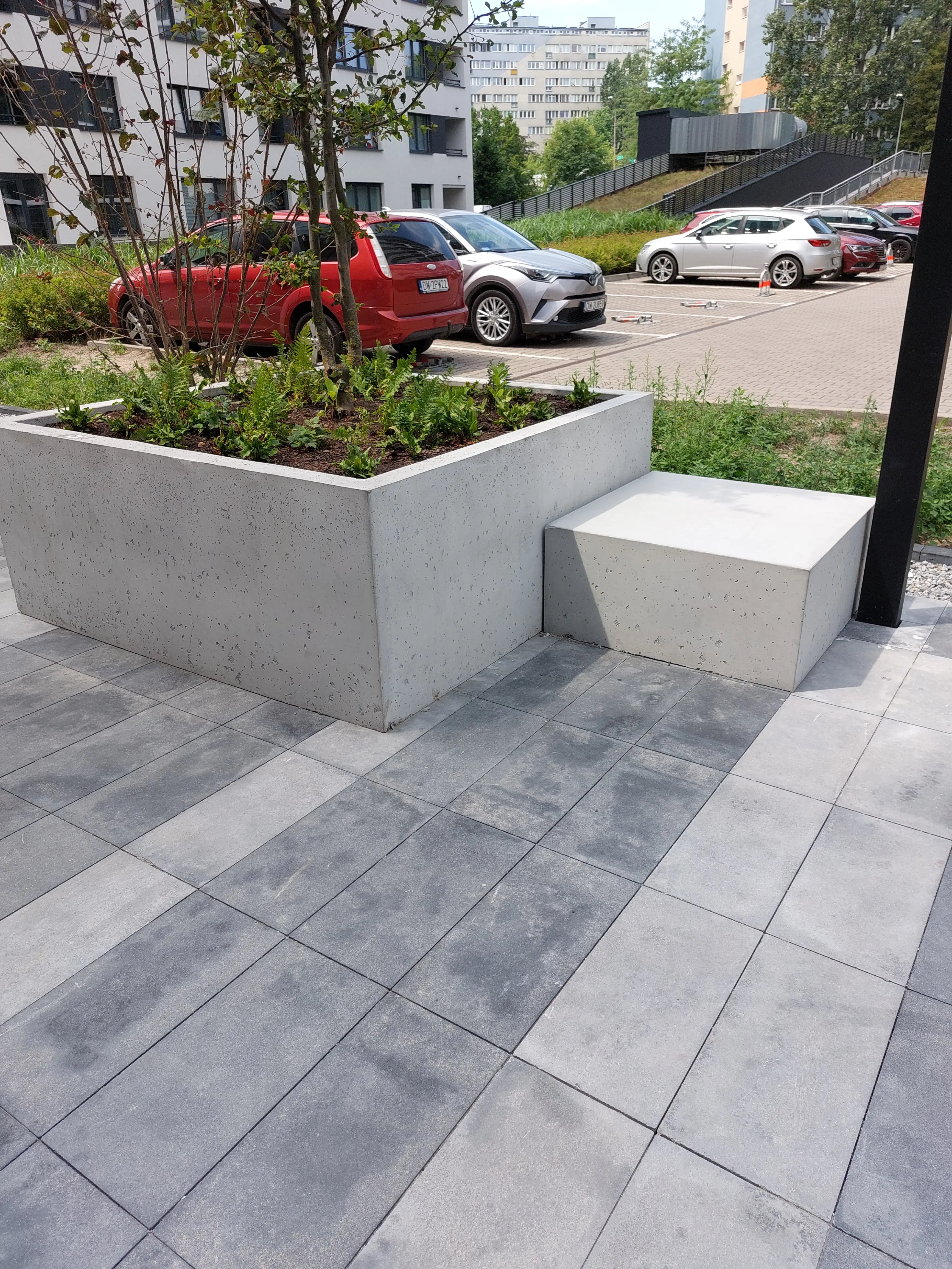 Outdoor Concrete Planters - Rectangle 50x120x50 cm in front of a parking lot Decormania UK