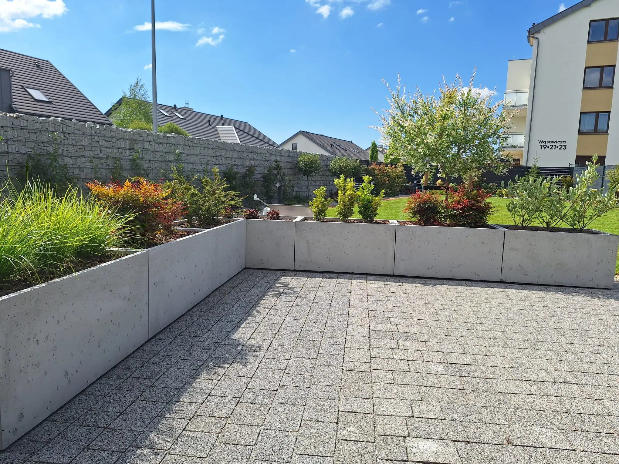 Outdoor Concrete Planters - Rectangle 50x120x50 cm in a housing estate Decormania UK