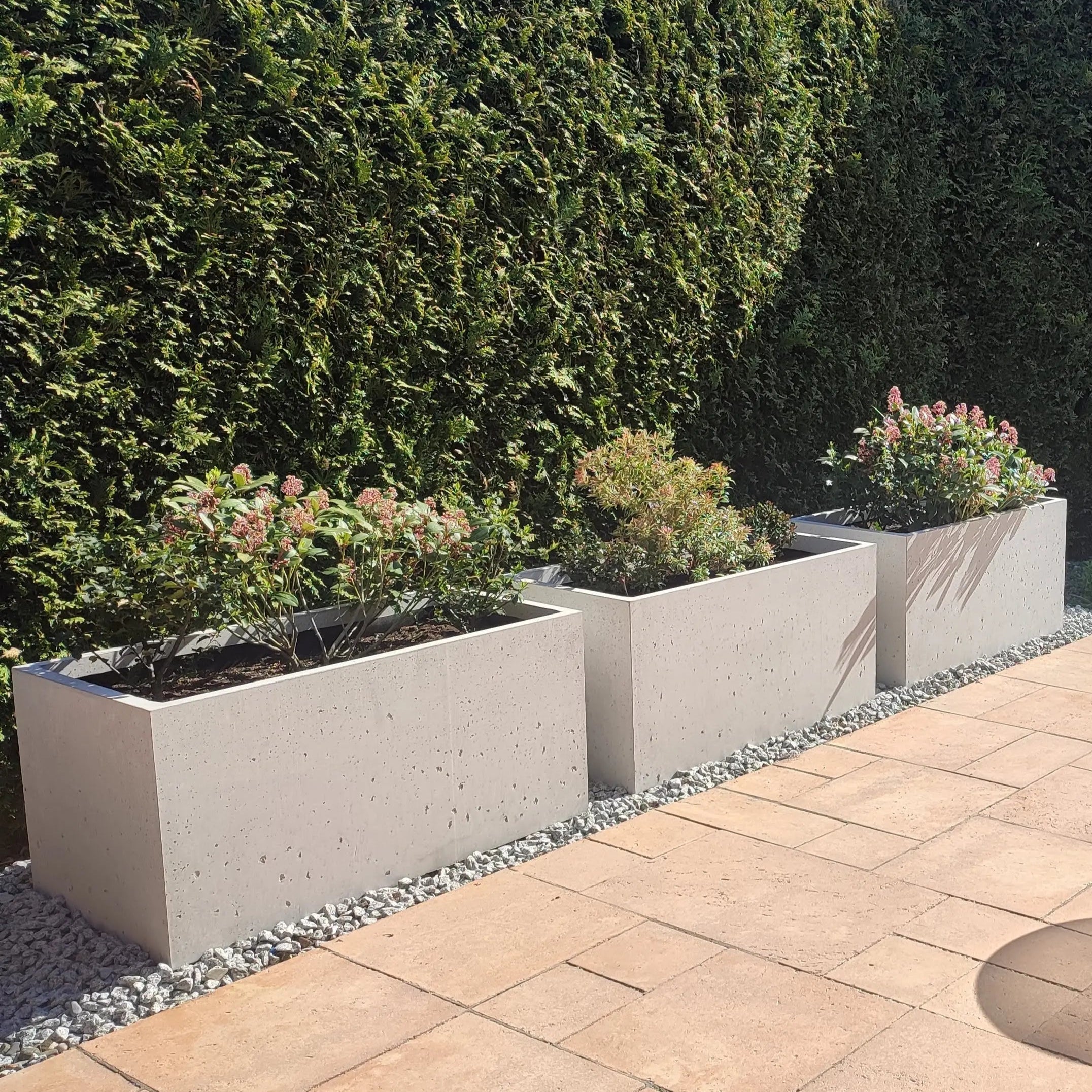 Outdoor Concrete Planters - Rectangle 50x120x50 cm in backyard with plants Decormania UK