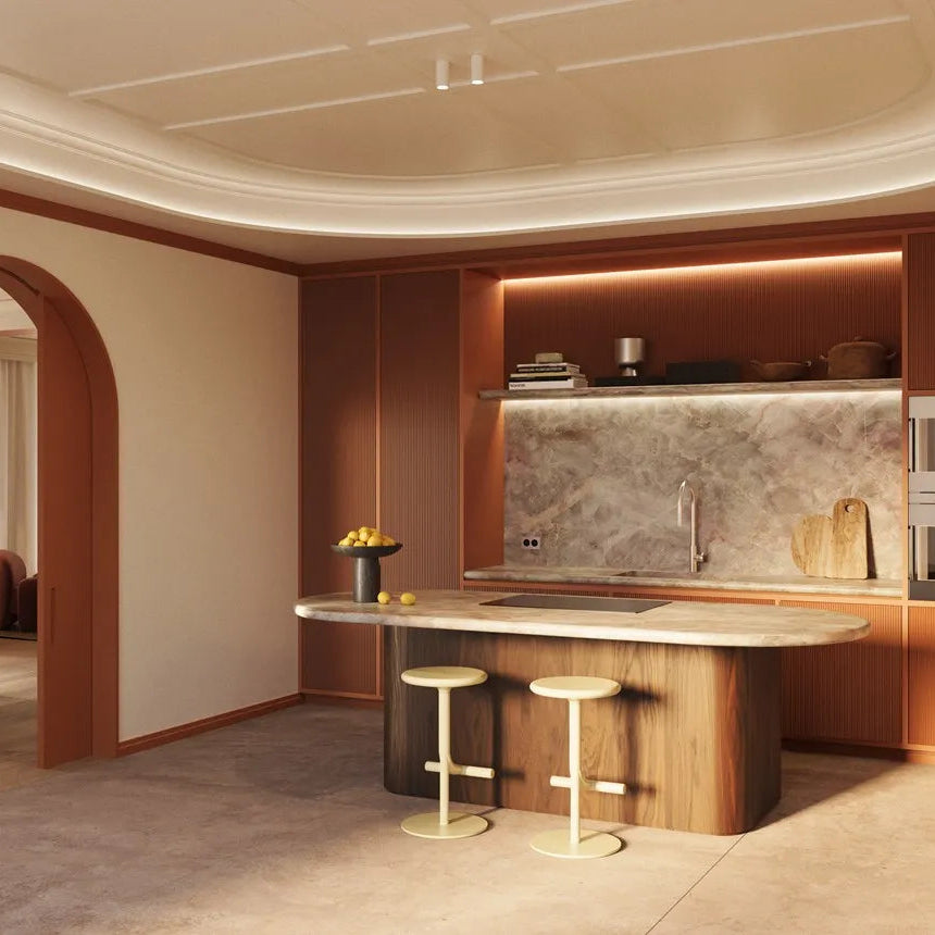 PLISSÉ L WALLSTYL ribbed wall panels in a terracotta finish with modern kitchen cabinetry