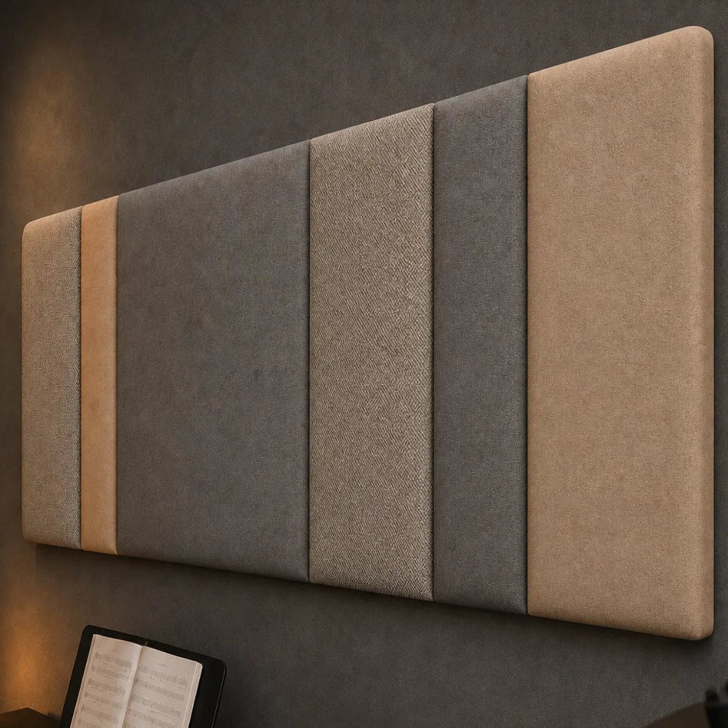 Close-up angled view of a multi-section upholstered wall panel, highlighting its olive-grey and beige colours, varied widths and contrasting woven fabric textures.