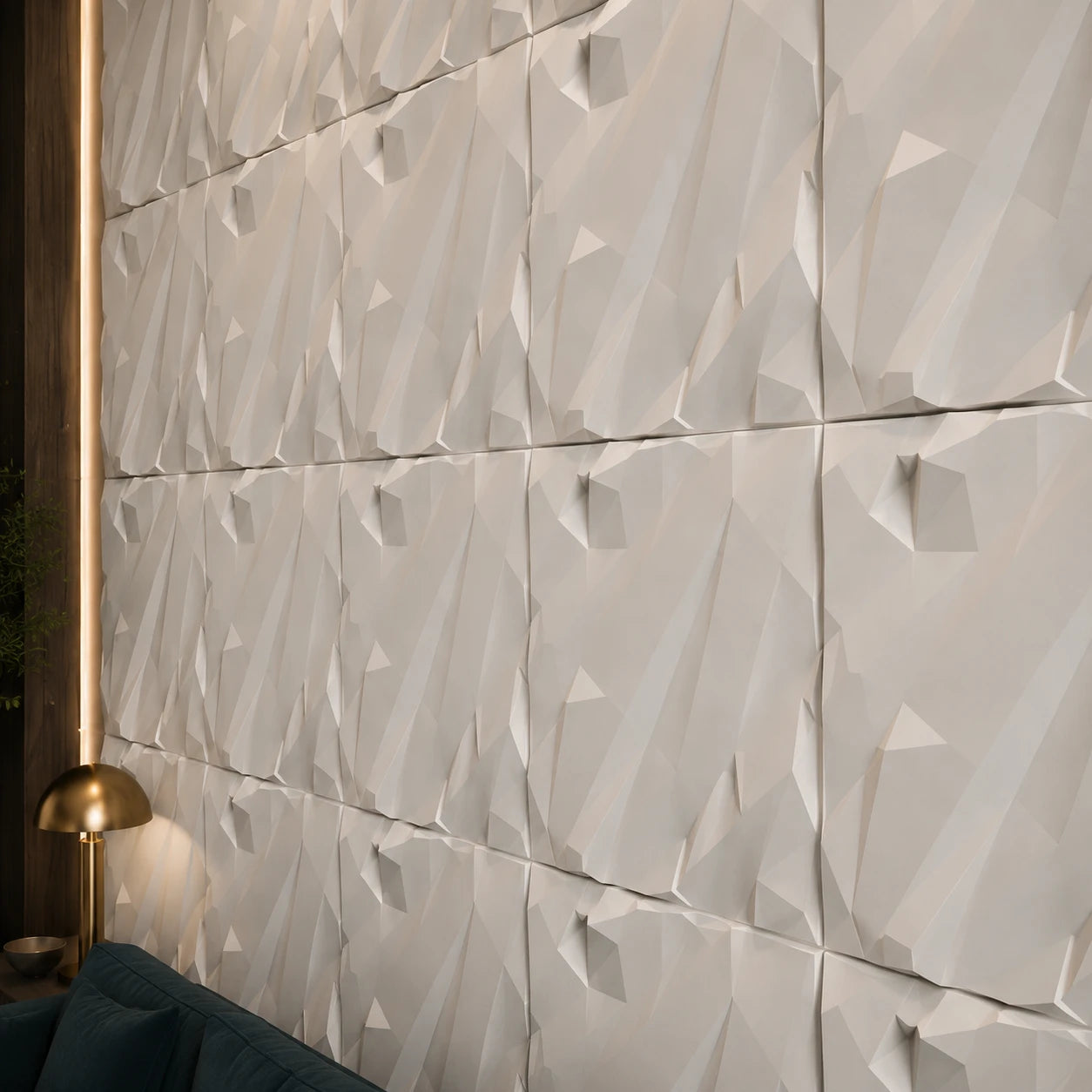 Close-up of white Rushed Rock gypsum 3D wall panels showing the angular rock-inspired relief