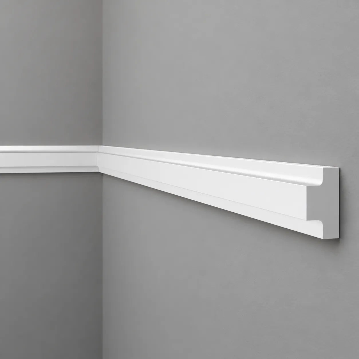 T40 WALLSTYL white decorative chair rail installed on a grey wall with modern shadow line detail