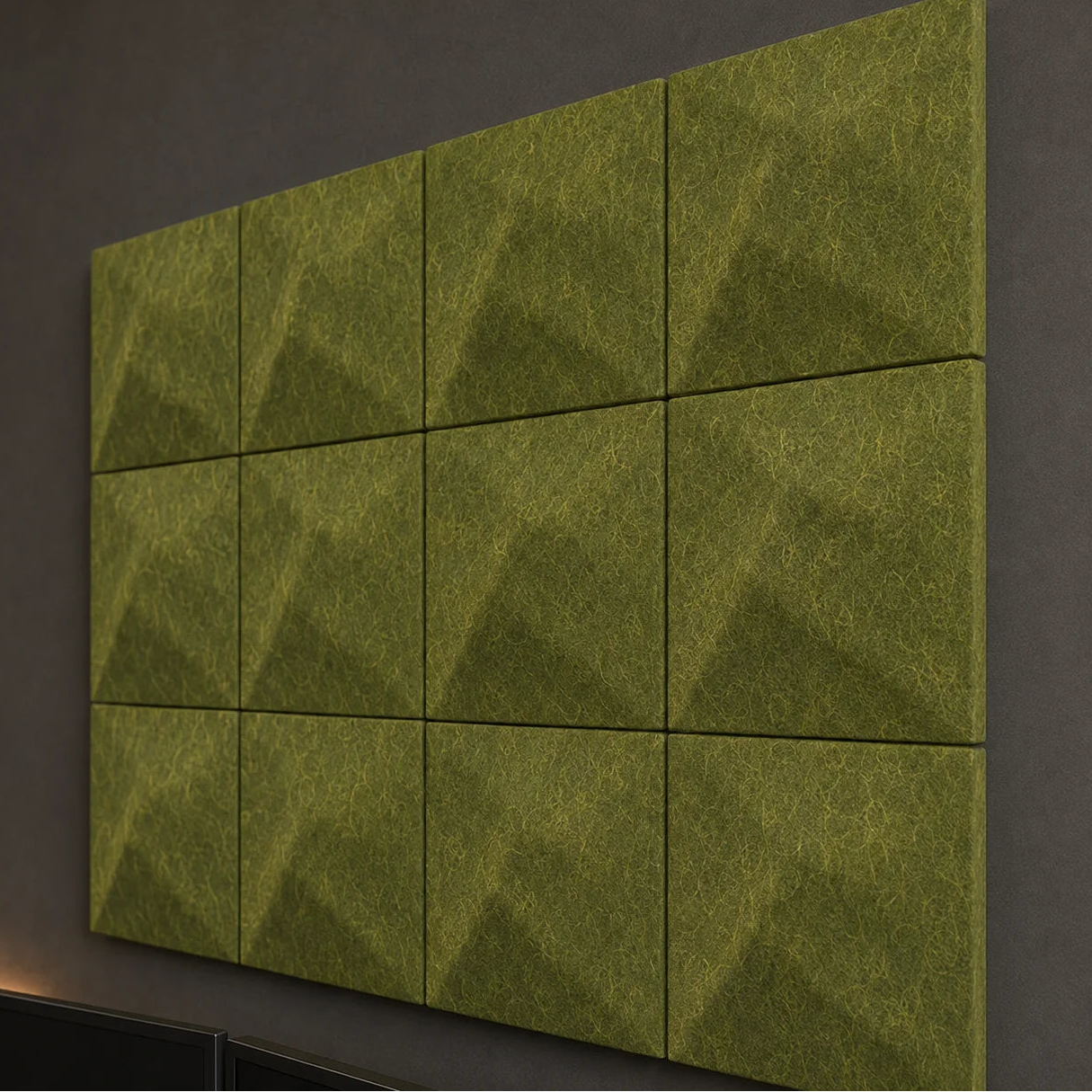 Close-up of olive 3D acoustic felt panels showing their raised TWIST pattern, even joints and textured surface