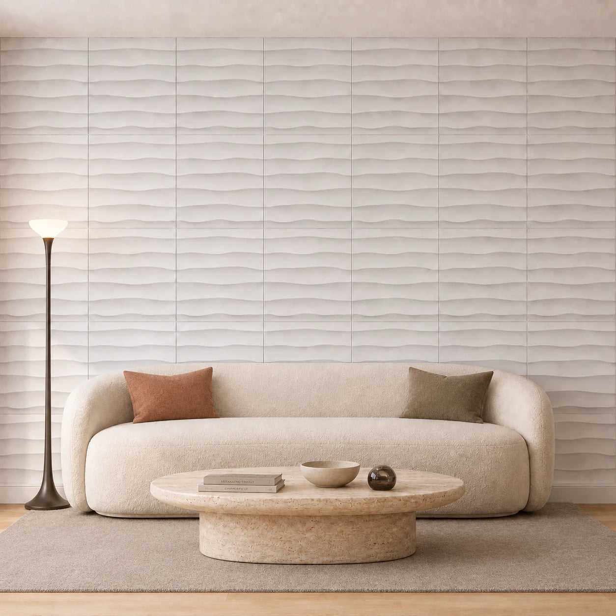 Modern Italian living room with white WAVES 3D polystyrene wall panels, curved cream sofa and travertine coffee table