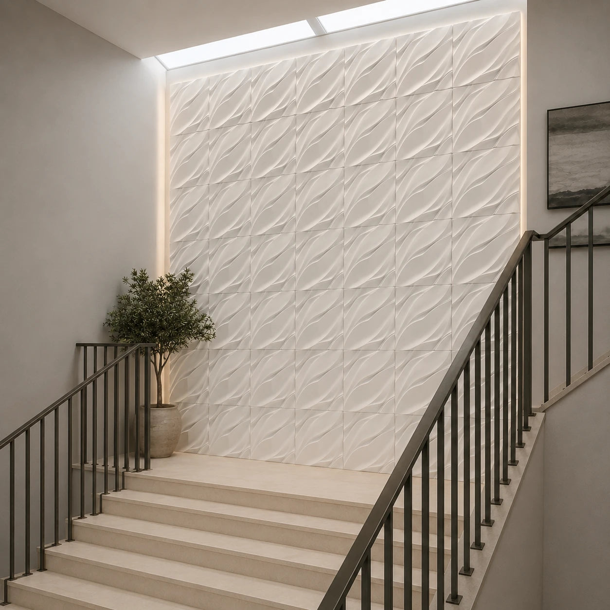 White Waves gypsum 3D wall panels installed on a feature wall in a modern staircase