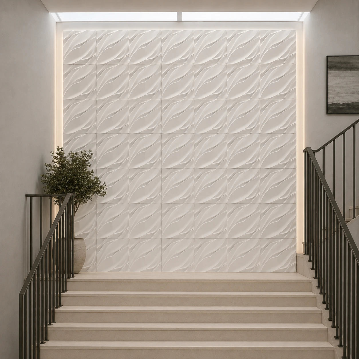 Front view of white Waves 50 × 50 cm gypsum 3D wall panels above a modern staircase