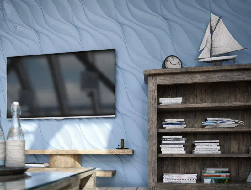 Model Waves - 3D Gypsum Wall Panels with a blue wave pattern behind the TV and bookshelf | DecorMania UK 