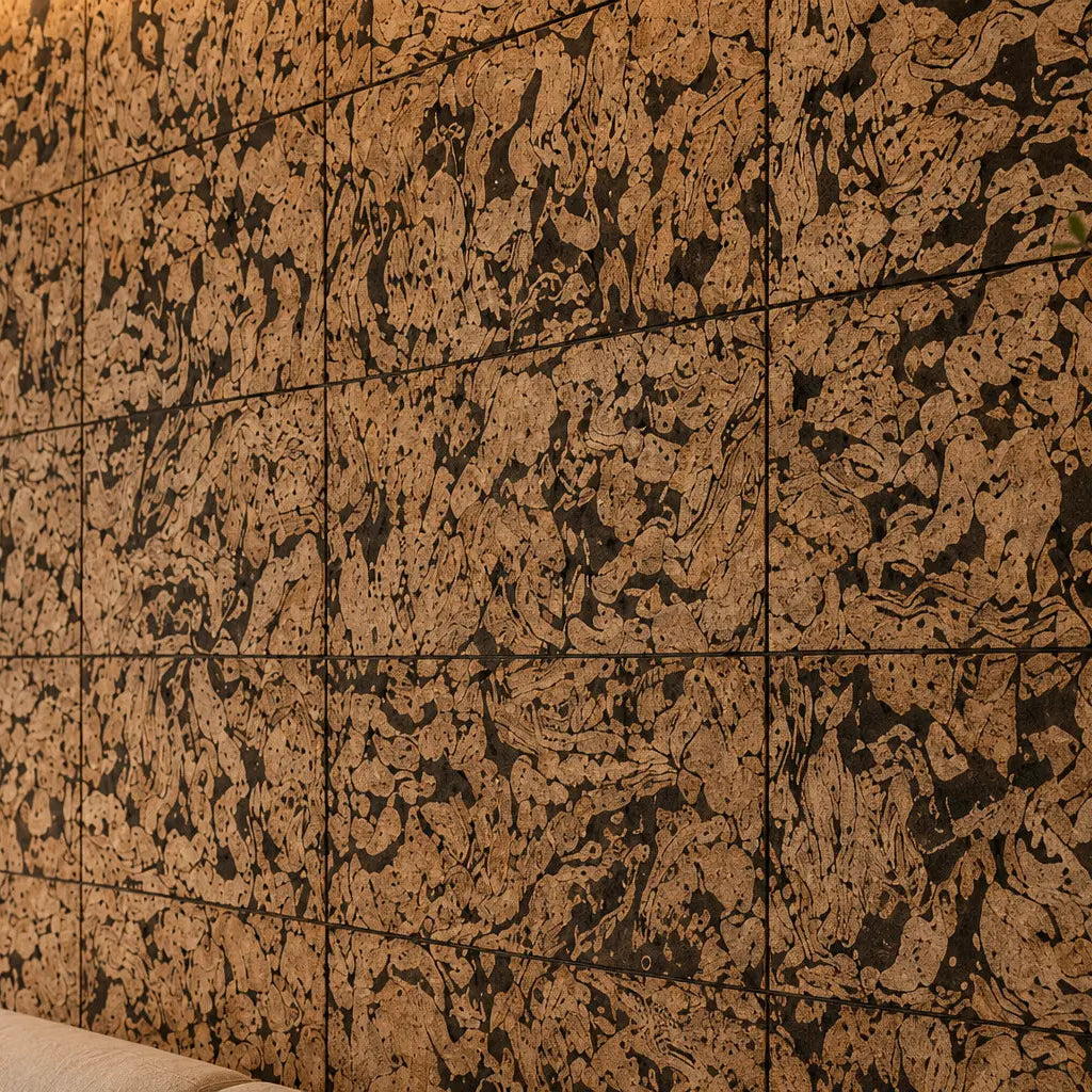 ZEBRA acoustic cork wall panels with a bold natural pattern in a modern living room with a cream sofa and dark wooden furniture close up view