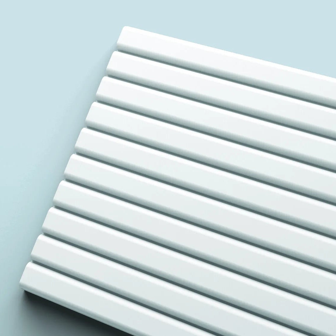 Close up view of CANELÉ L Arstyl® 3D Wall Panels highlighting the clean lines and sleek design | DecorMania UK
