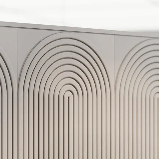 Close-up of beige CANELÉ R L ARSTYL panels forming rounded arches above vertical fluted wall panels