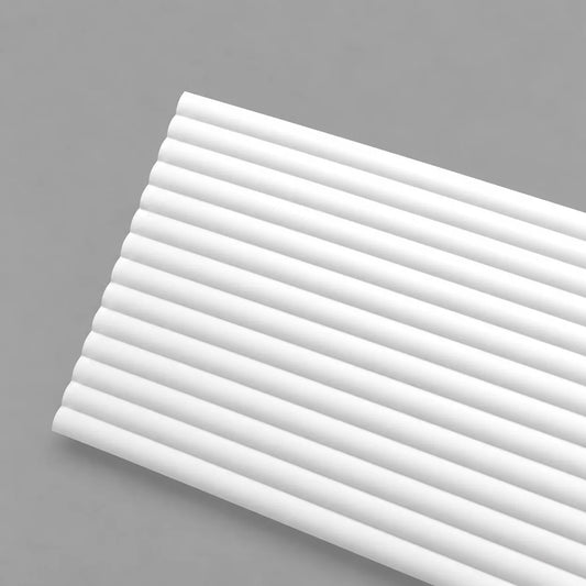 White CANOPEE S wall panel with rounded ribbed detailing on a grey background