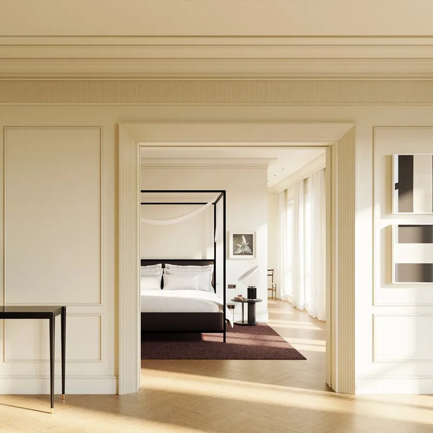 CANOPEE S ribbed panels framing a bedroom doorway and forming a decorative frieze in a cream interior