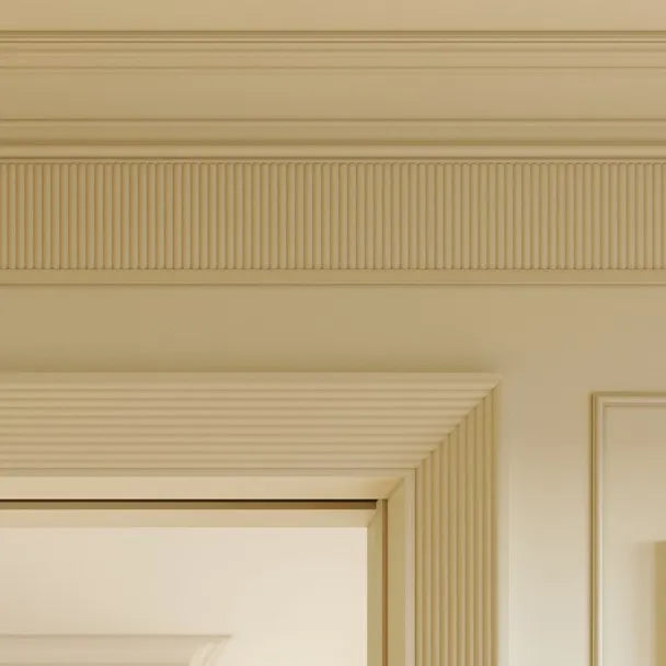 Close-up of cream CANOPEE S ribbed panels around a doorway and beneath ceiling mouldings
