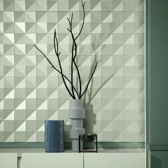 White FL10 WALLSTYL skirting board in a contemporary interior with geometric wall panels