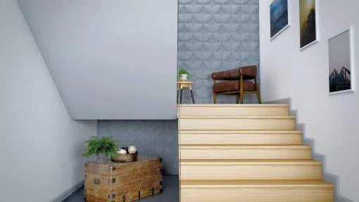 FL5 2.44M WALLSTYL SKIRTING BOARD installed along the bottom of the wall, next to a staircase and a chair | DecorMania UK