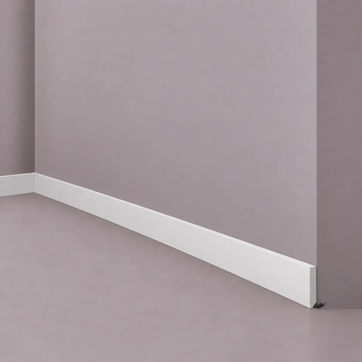 White FT2 WALLSTYL skirting board with clean reversible profile and cable concealment space