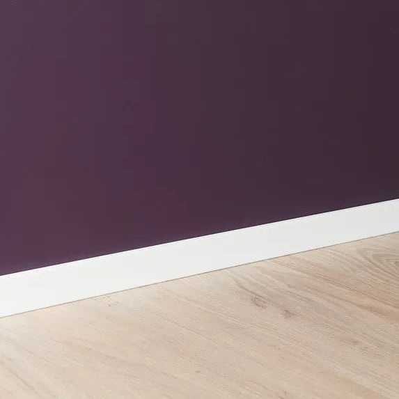FT2F WALLSTYL white skirting board on dark purple wall