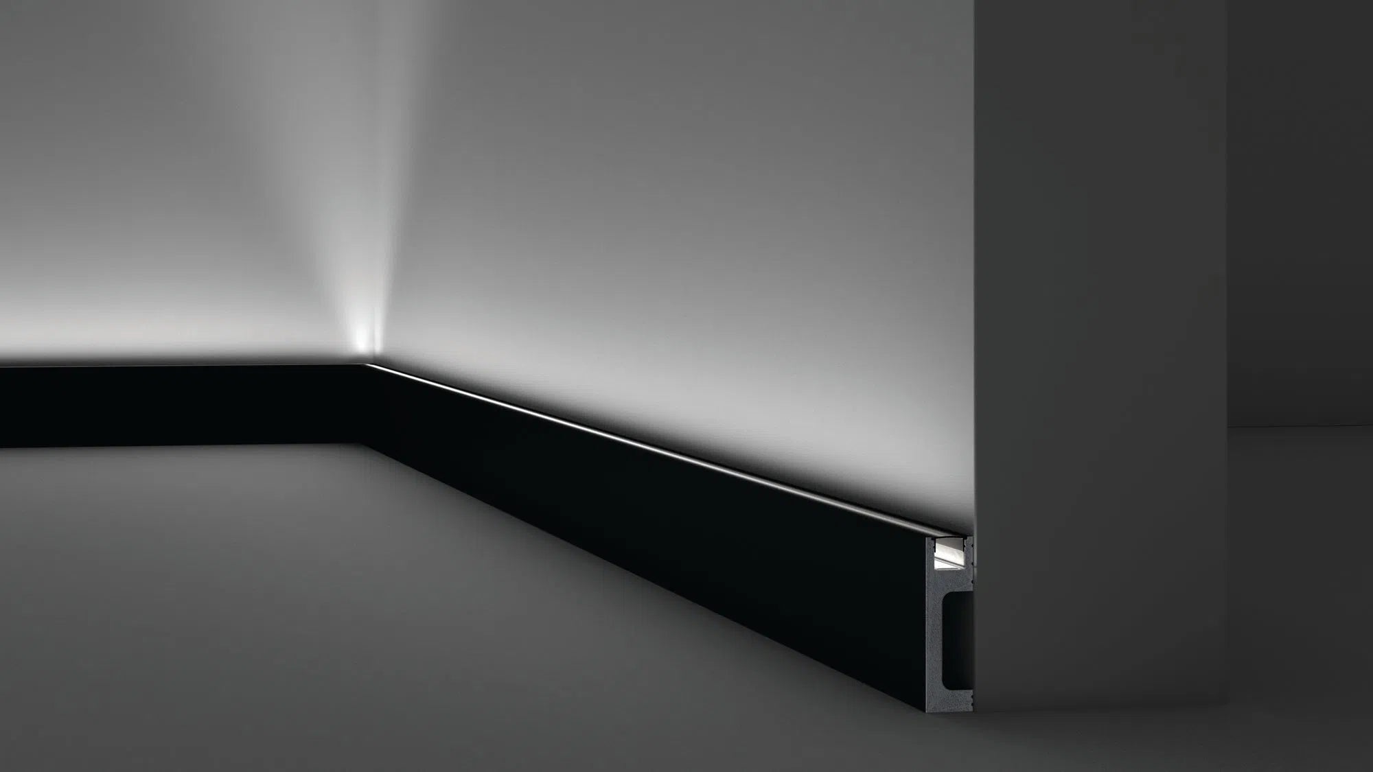 IL10 2M BLACK WALLSTYL SKIRTING BOARD - Skirtings with cable channel owner detail on a light-colored wall | DecorMania UK