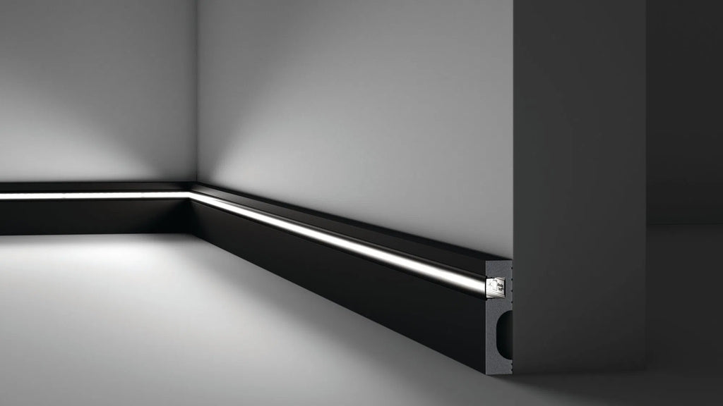 IL11 2M BLACK WALLSTYL SKIRTING BOARD - Skirtings with cable channel owner detail on a light-colored wall | DecorMania UK | DecorMania UK 