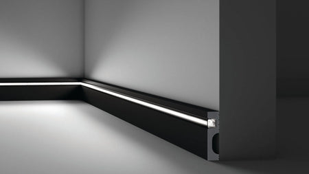 IL11 2M BLACK WALLSTYL SKIRTING BOARD - Skirtings with cable channel owner detail on a light-colored wall | DecorMania UK | DecorMania UK 
