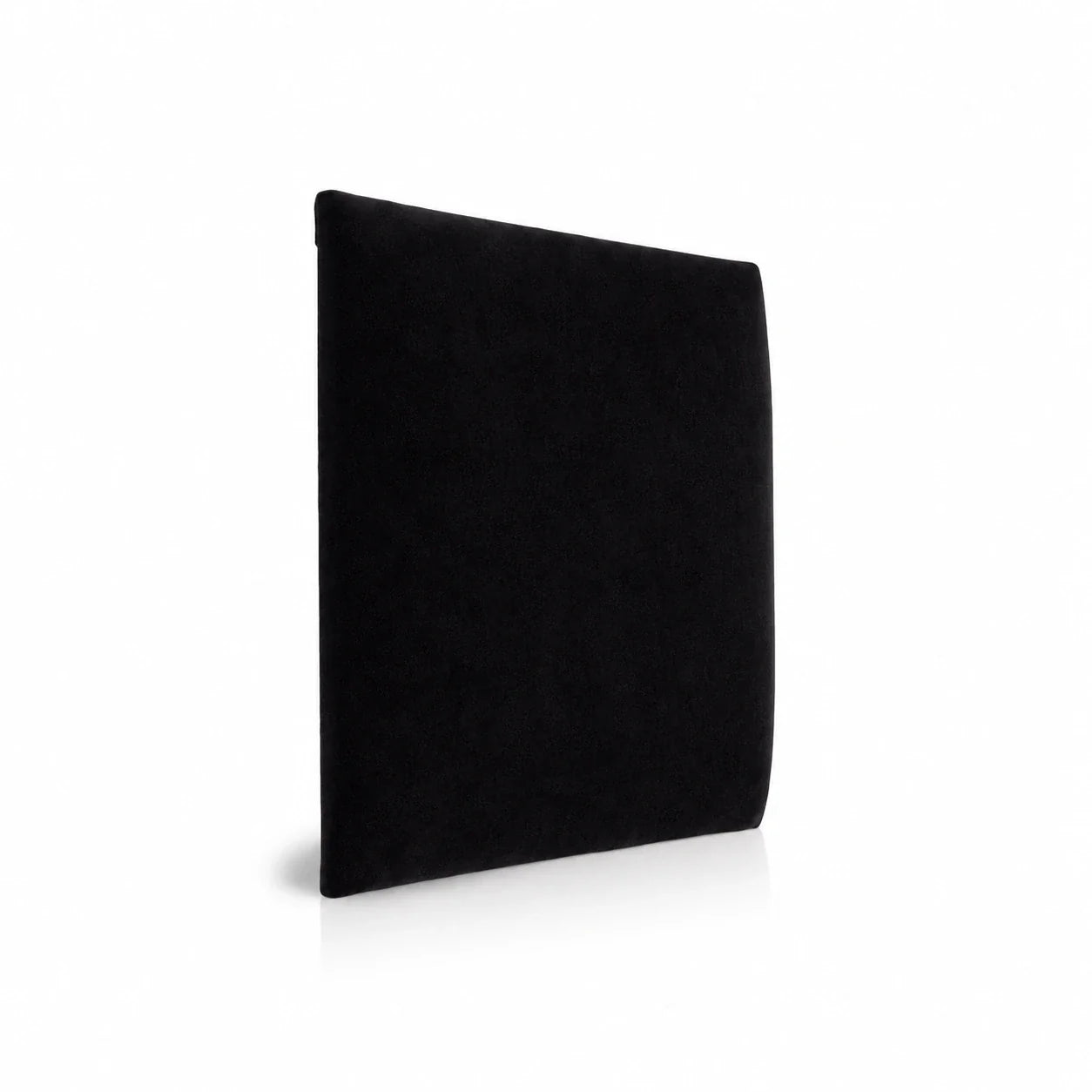 Black upholstered padded wall panel in soft fabric finish