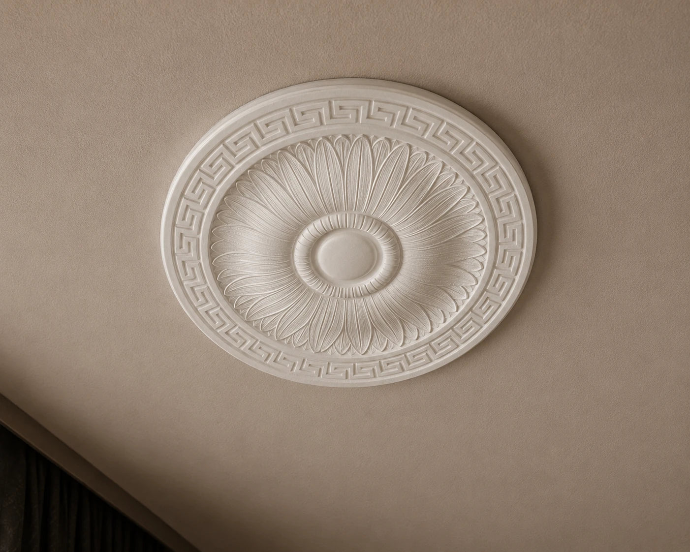 Close-up of the white R23 Arstyl ceiling rose with radiating leaf reliefs and a Greek key border.