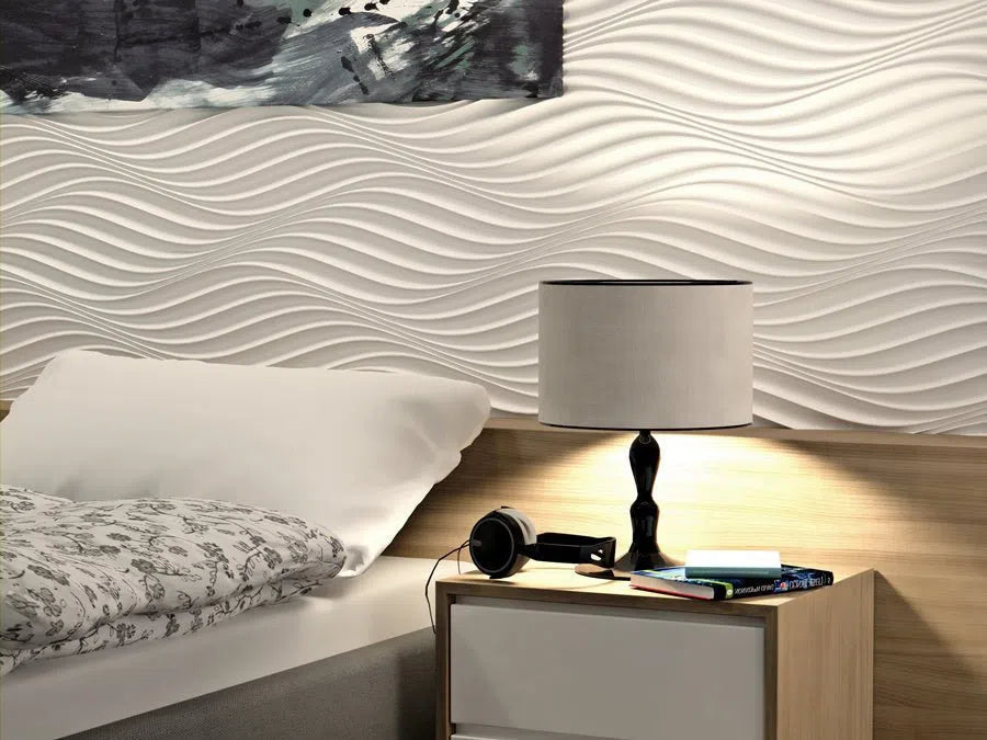 THE WIND 3D Wall Panel Model 04 - 3D Polystyrene Wall Panels behind the bed, creating a serene and textured backdrop, with modern nightstand elements like a lamp and books | DecorMania UK
