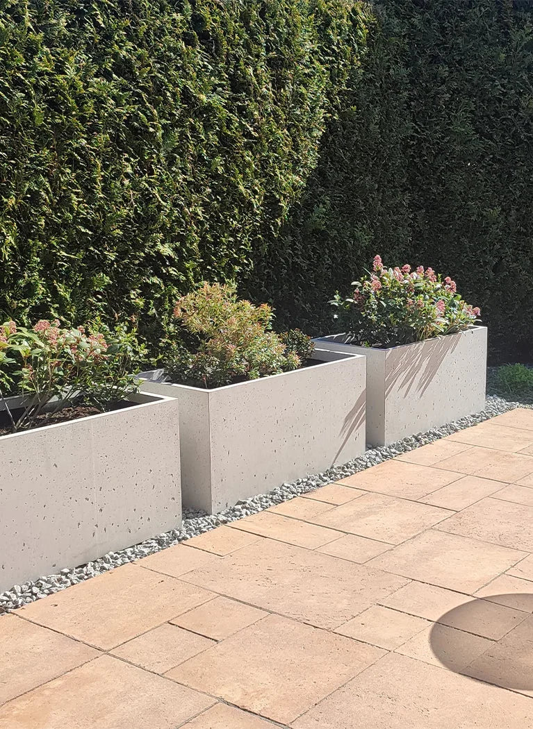 Outdoor Concrete Planters in the garden outside Decormania UK