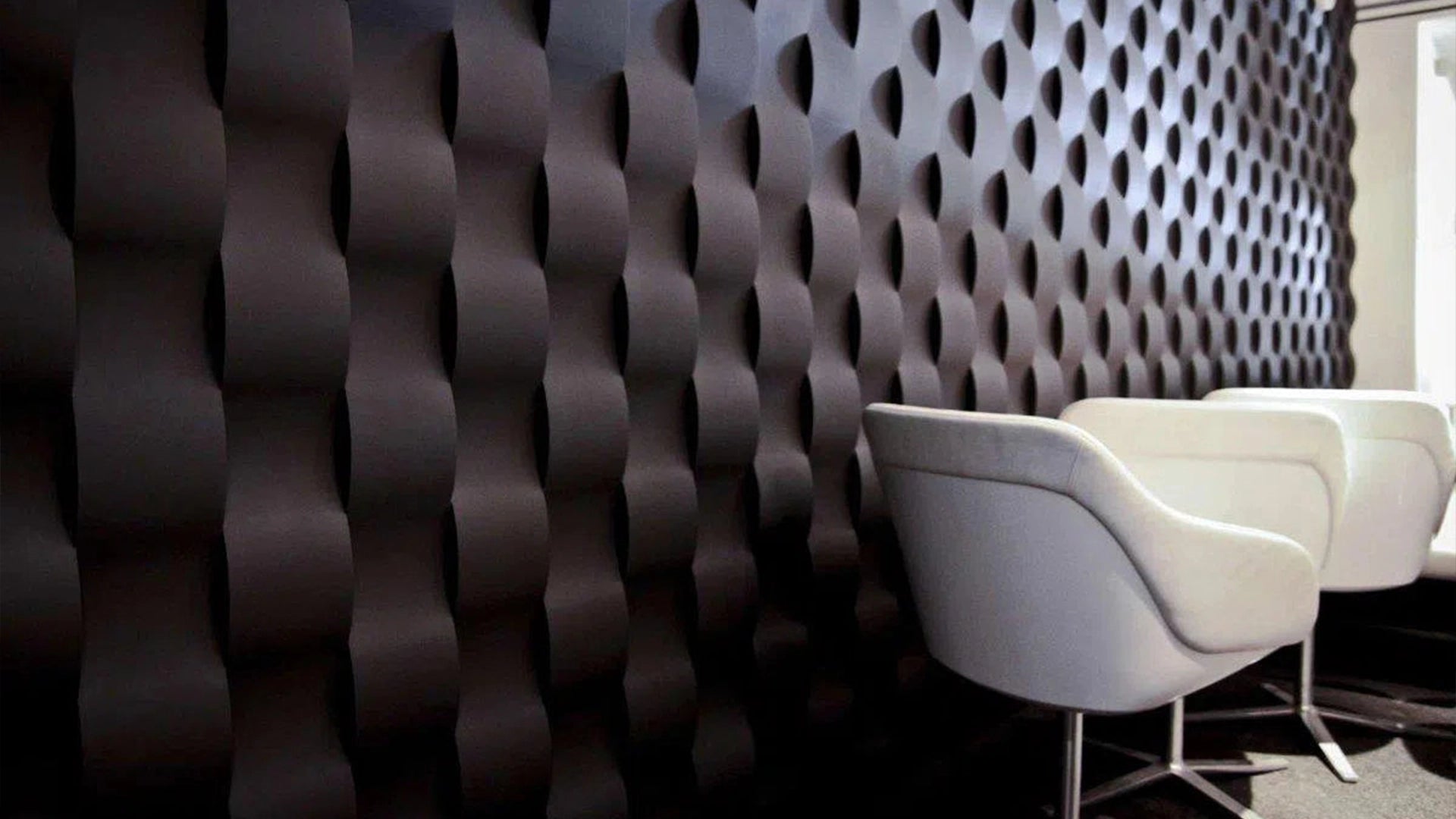 Premium Gypsum Adhesives & Accessories Black feature Wall with armchairs