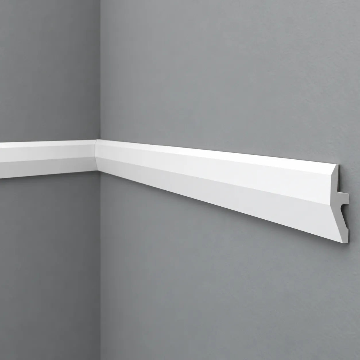 W1 WALLSTYL white decorative chair rail installed on a grey wall with clean architectural detailing