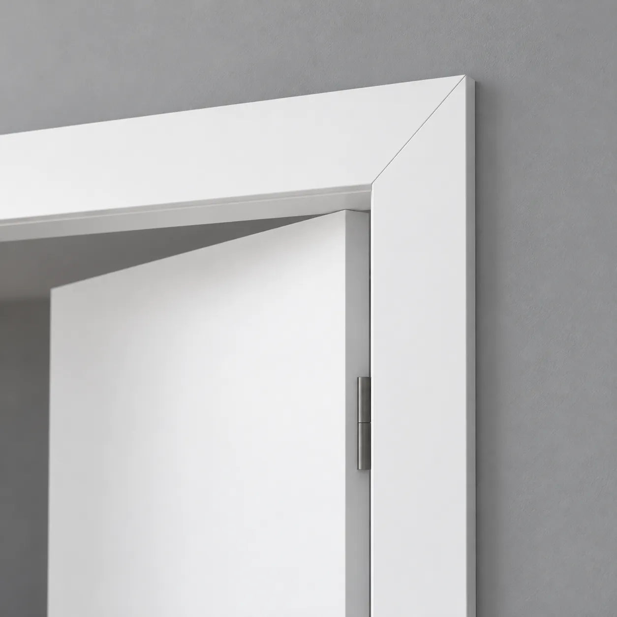 Close-up of WD2-2200 WALLSTYL white door frame profile with clean mitred corner detail