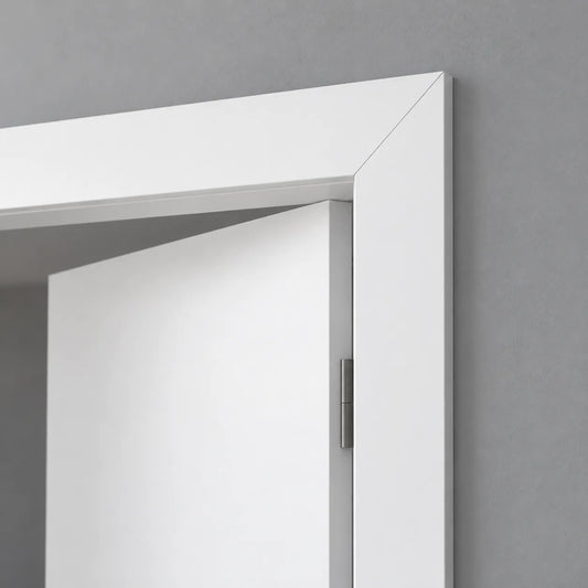 Close-up of WD2-2200 WALLSTYL white door frame profile with clean mitred corner detail