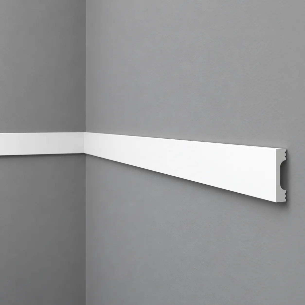 WD5 WALLSTYL white decorative chair rail with slim minimalist profile installed on a grey wall