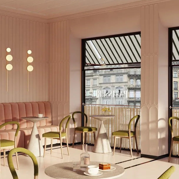 Elegant pink café with WL13 WALLSTYL wall trim, decorative panels, olive green chairs and round tables